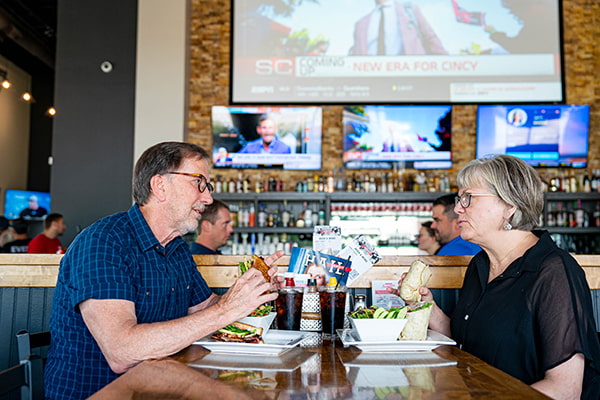couple dining at table in bar