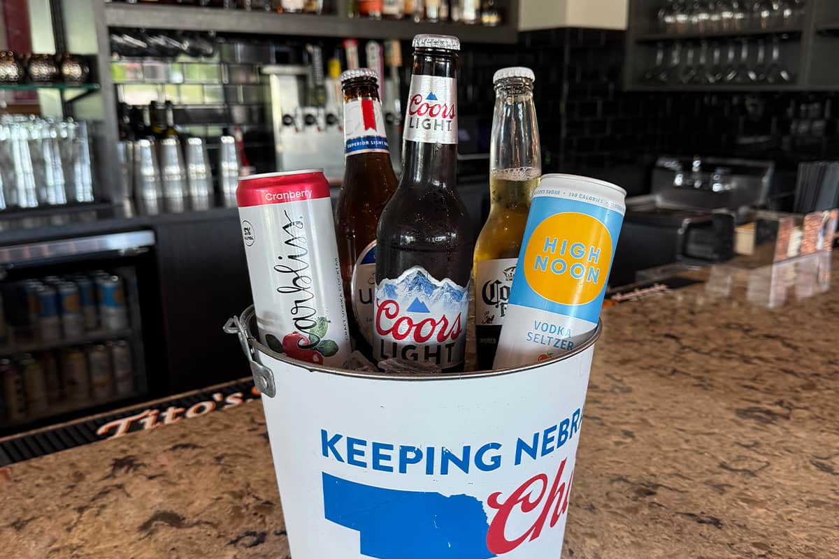 Bucket of bottled and canned beer available for selection during private parties